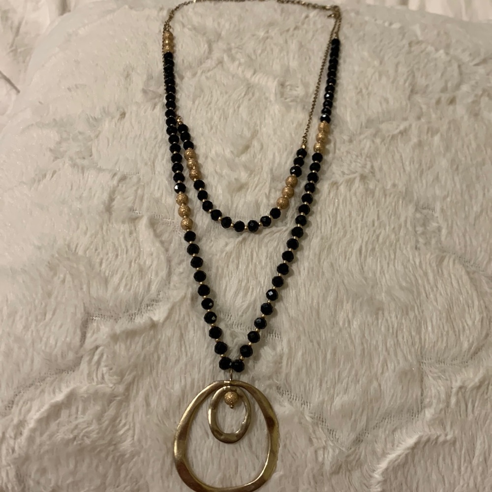 Gorgeous black crystal necklace plus gold tone beads and pendant